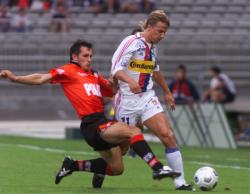 [Football : Olympique lyonnais - Rennes (2-2)]