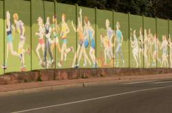 Mur peint : le mur d'enceinte du boulevard périphérique à Bron